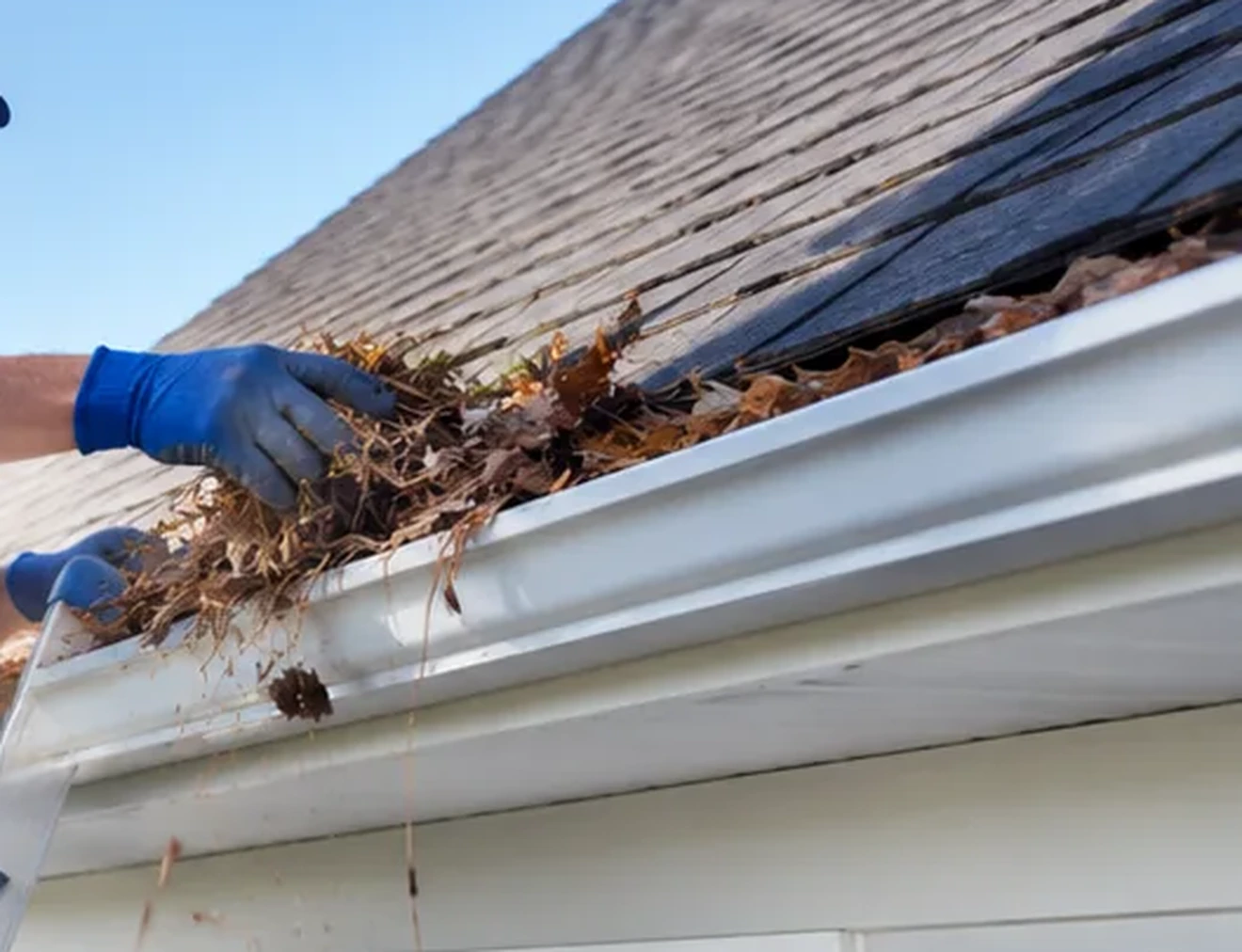 Gutter Cleaning Durham NC Gutter cleaning for leaves and pine needles on a Durham NC home