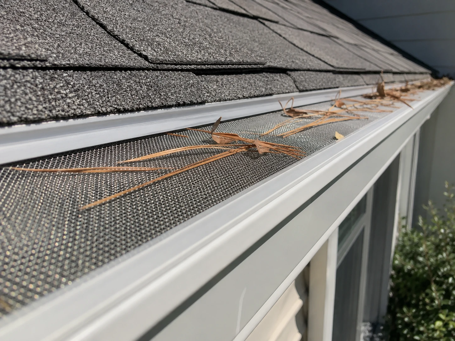 Gutter Guards Durham NC Gutter guard installed over a white K-style gutter on a Durham NC home