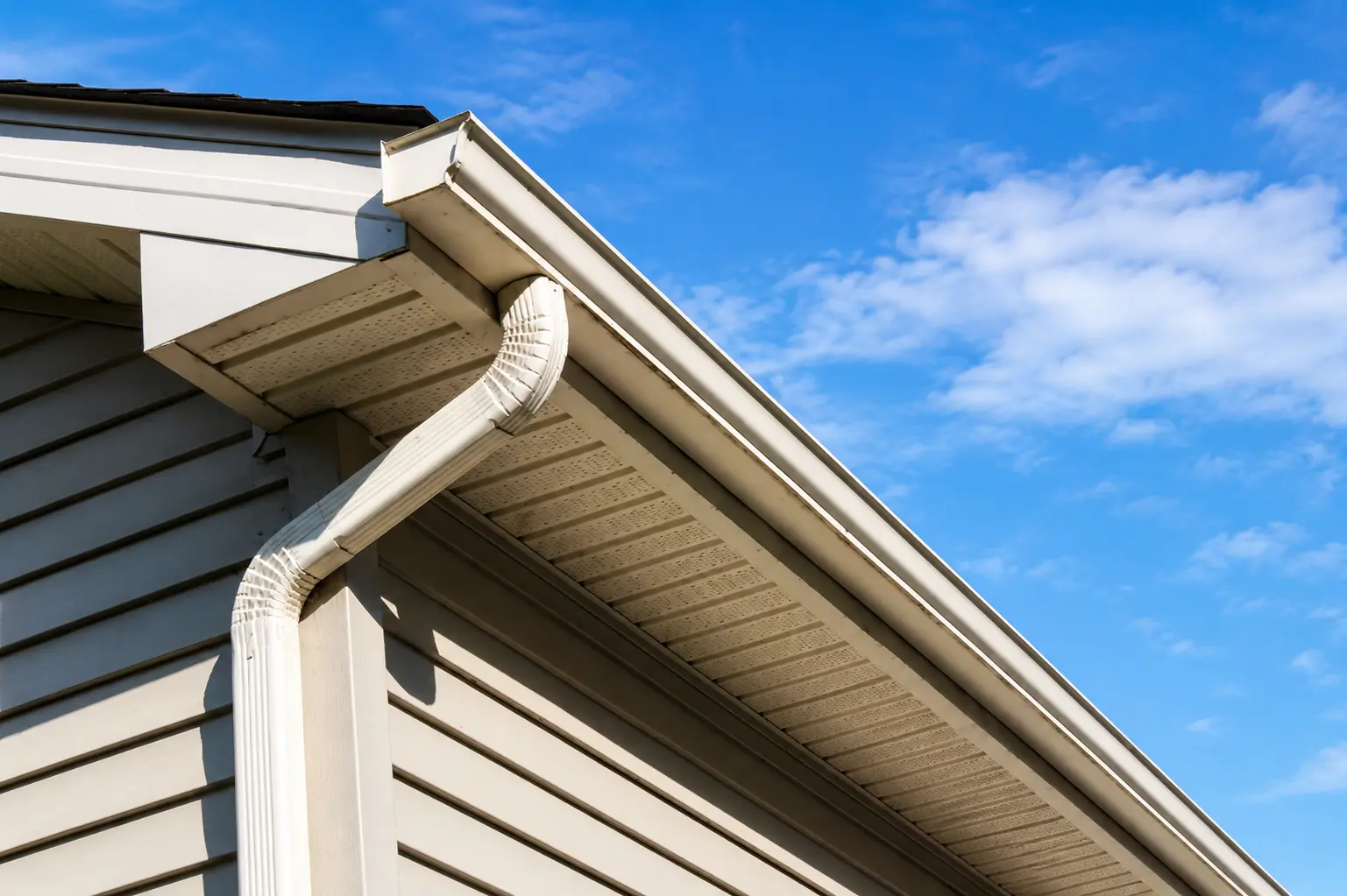Gutter Outlet and Downspout Repair Durham NC White K-style gutter outlet and smooth rectangular 3x4 downspout repair Durham NC